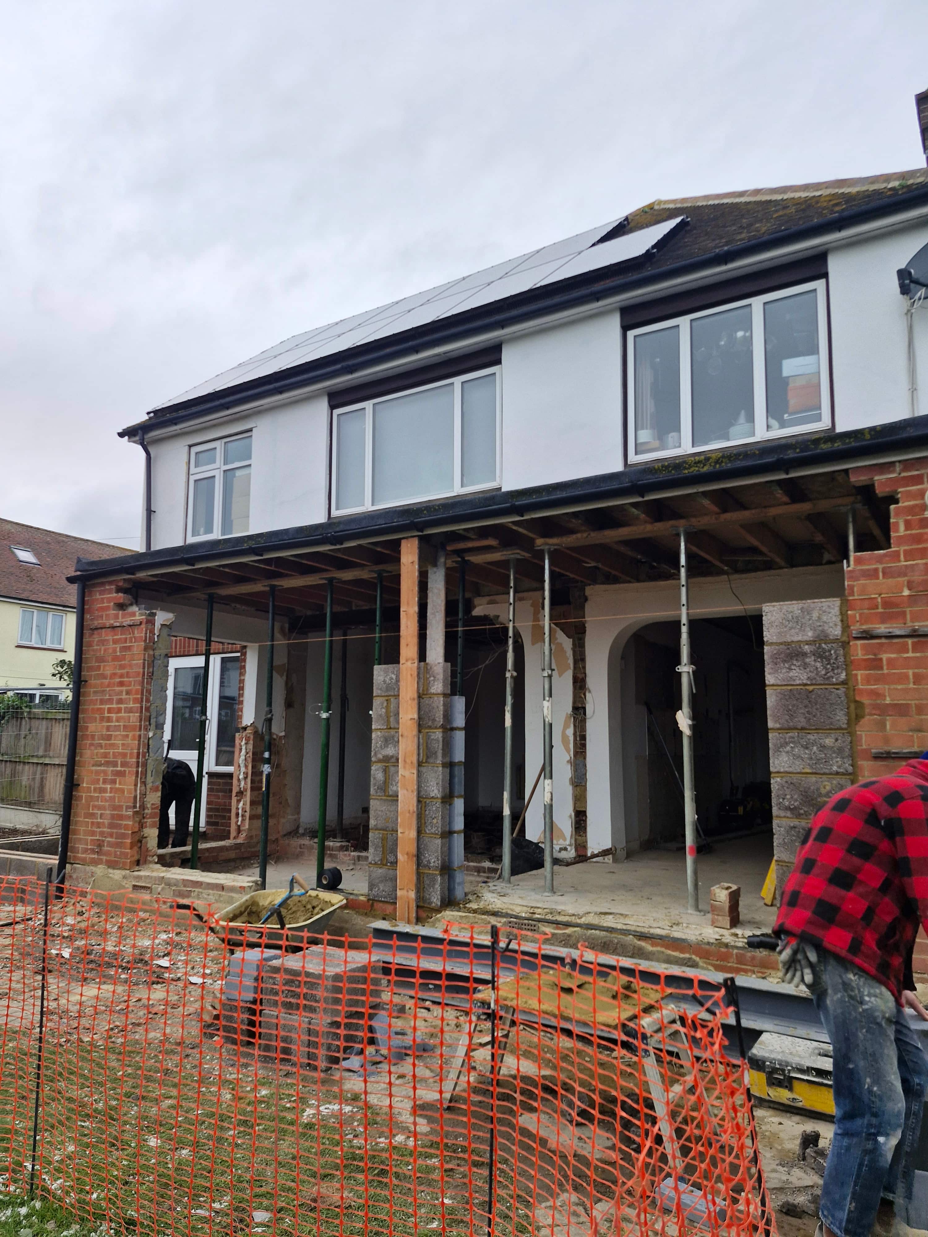 Single-storey rear extension build with new brickwork and openings